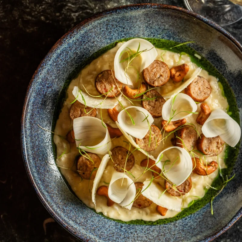 Risoto de linguiça de cogumelo ostra com palmito pupunha.